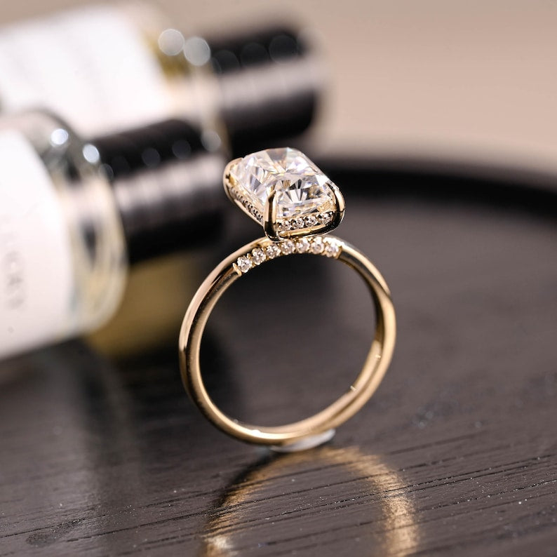 Pavé engagement ring showing diamond-set shoulders