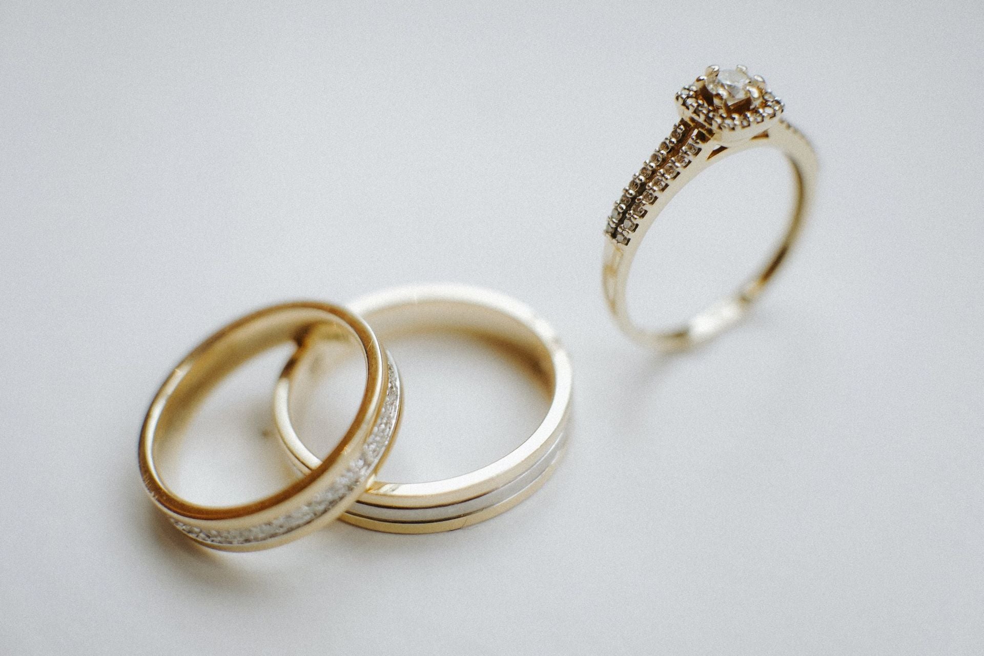 Cathedral engagement ring with raised shoulders supporting the centre stone