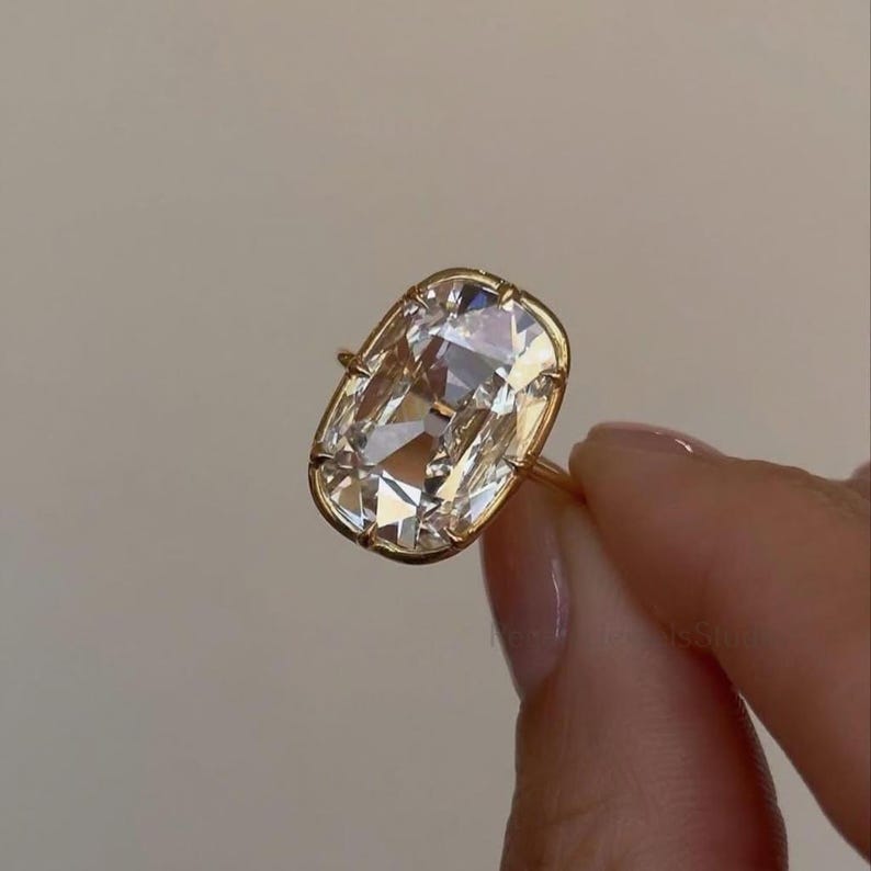 Cushion cut diamond variation for engagement ring design