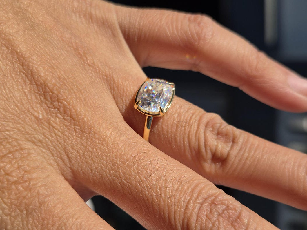 Bespoke east-west engagement ring design