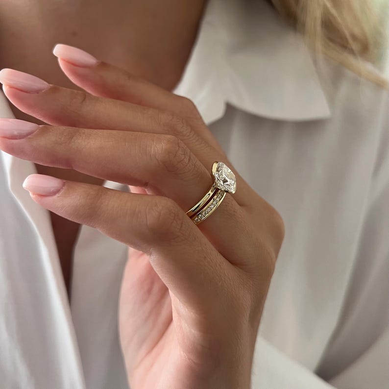 Classic solitaire engagement ring profile