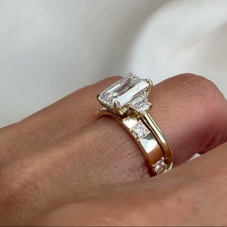 Raised engagement ring setting with space for a wedding band