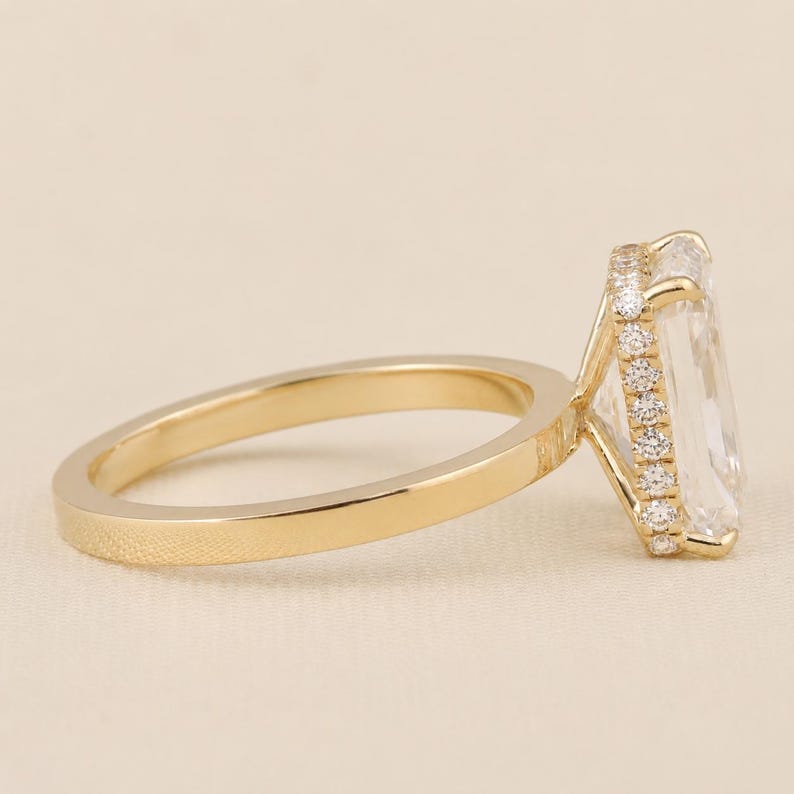 Hidden halo detail on a bespoke radiant cut engagement ring