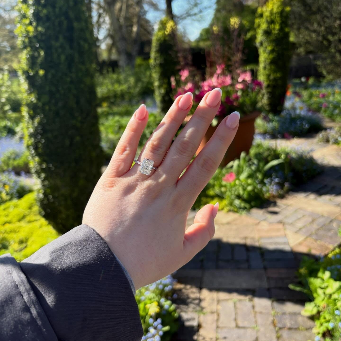 Morgan wearing her 5 carat radiant cut bespoke engagement ring