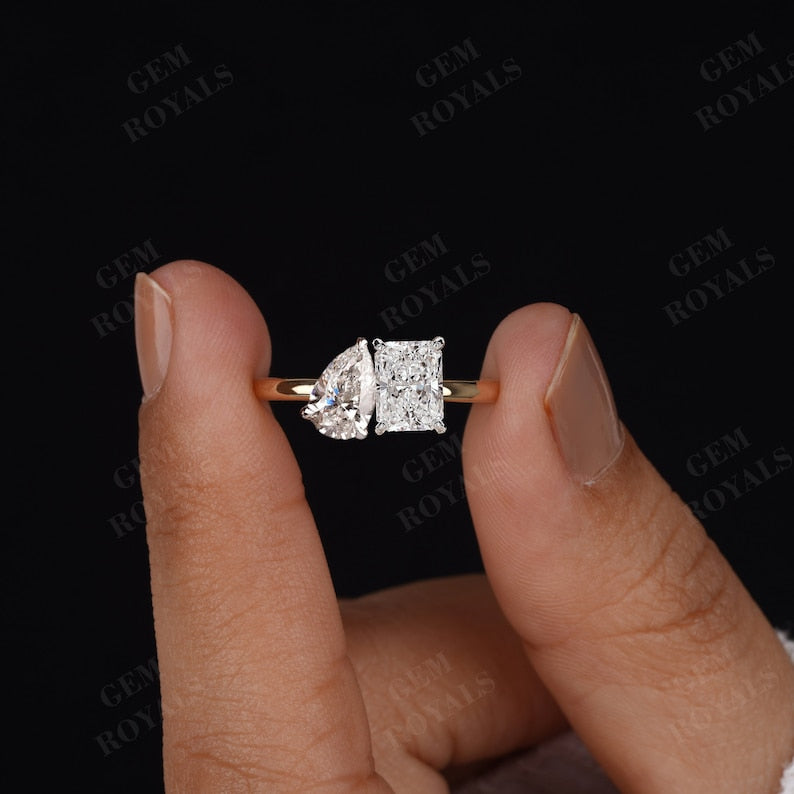 Toi et moi ring showing oval and pear stone pairing