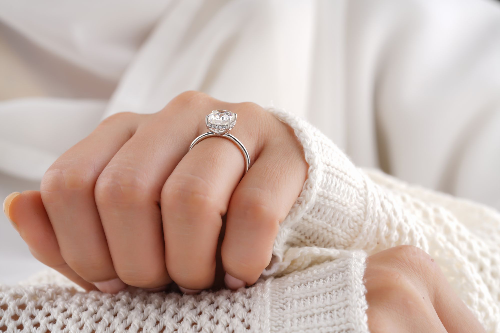 Bespoke hidden halo engagement ring